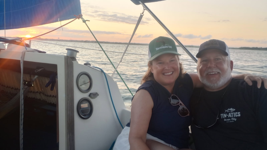 Couple enjoying a sunset sail in OCNJ